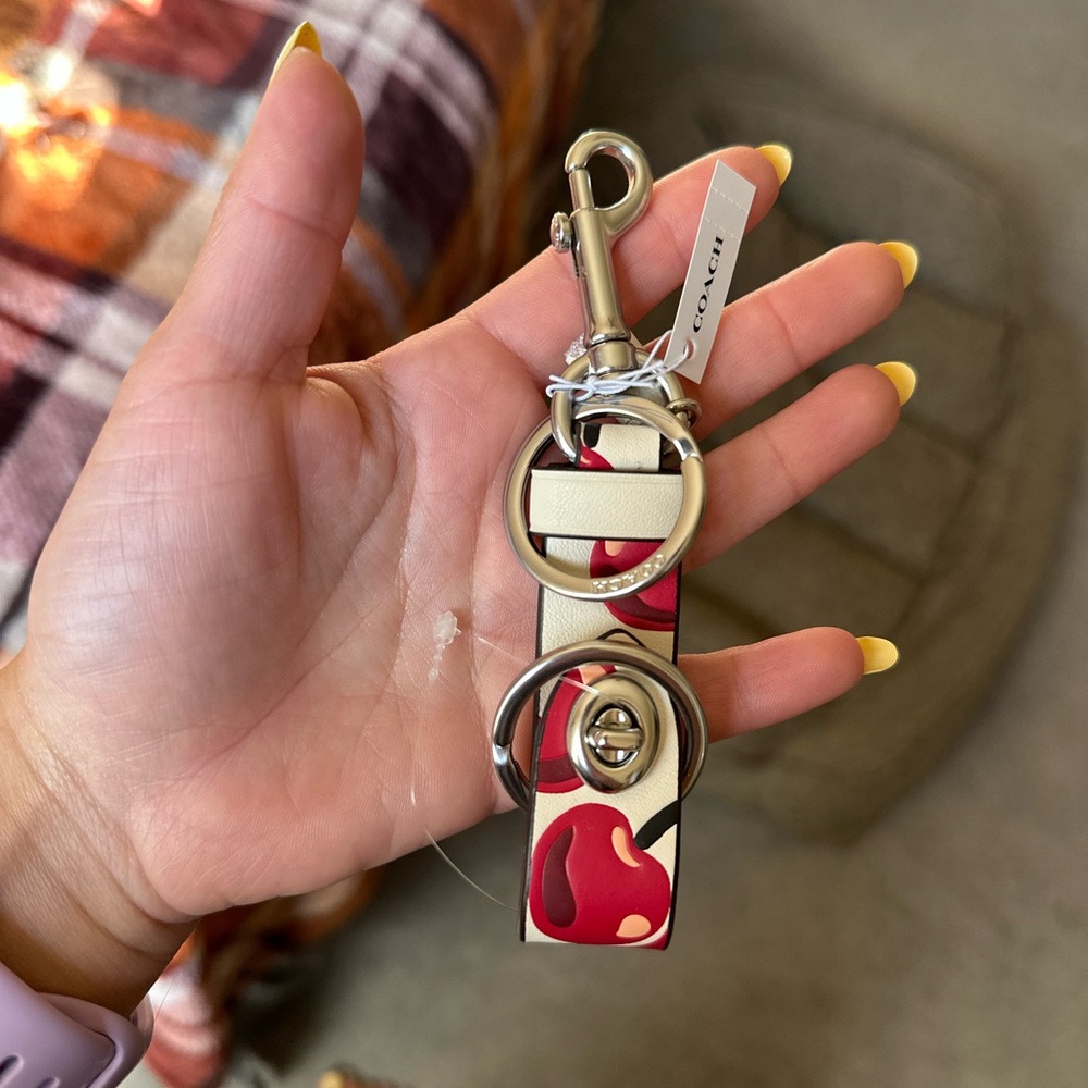 Coach outlet cherry White trigger snap bag charm keychain